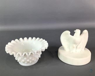 	
Fenton Bicentennial Eagle and Candy Dish
One Fenton American Bicentennial Eagle figurine, labeled 1776-1976 on bottom. 3.5"Hx3.5"W One Fenton white milk glass Hobnail small candy dish with ruffled rim. 2"Hx5"W Both show no visible cracks or chips.