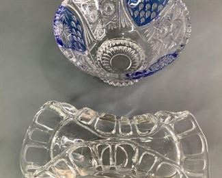 Centerpiece and Edge Bowls
Appears to be a Duncan Miller Canterbury Tiffin Glass Open Lace Turned Edge Centerpiece Bowl approx. 10". Also includes what appears to be Anna Hutte Bleikristall Candy Dish approx 8" (missing lid).