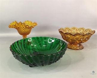 Depression Glass
One Emerald Green Hobnail footed bowl by Anchor Hocking. 3"Hx9"W One L.E. Smith Amber Moon & Stars fruit bowl.4"Hx7.5"W One Kanawha Glass Co. Amber Hobnail Candy dish with ruffled rim. 5.5"Hx6.5"W. No visible cracks or chips.