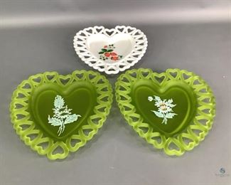Westmoreland Satin Glass Plates
Three (3) heart shaped dishes by Westmoreland. All have heart-shaped lace edging. 8.25"Hx7.25"W Two are green satin glass with hand painted floral designs (one has worn area on design), the other is white glass with strawberry painted design.No visible cracks or chips
