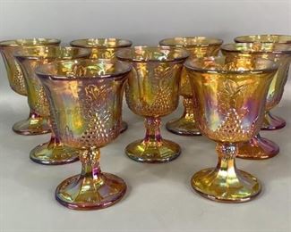 Carnival Glass Goblets
Nine (9) matching orange carnival glass goblets by the Indiana Glass Co. All are Harvest pattern and 5.25"H. One has a chip on the rim, otherwise no other damage seen.