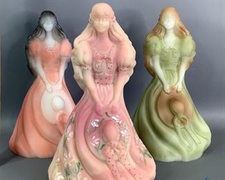 Colorful Fenton Southern Belles
Three (3) Fenton Southern Belle Figurines. One is peach with black hair. one is green with brown hair and hat. One is pink with hand painted floral design with grold tone polka-dot hightlights. It is signed by S. Miller and numbered 539/2000. All are 8.5"Hx5"W, no visible cracks or chips.