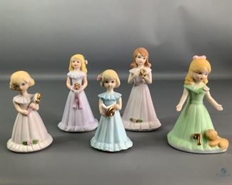 Enesco Growing Up Girls
Set of five (5) Enesco Growing Up Birthday Girls. Includes years 5 through 9. Tallest is 5"H and all are stamped with the Growing Up stamp on bottom. No visible cracks or chips.