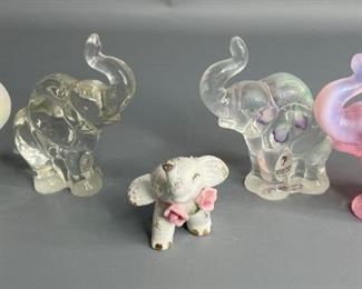 Fenton Elephants and More
Two of the elephants are marked Fenton. The white carnival glass has a bisque rose, that is chipped. The clear one is hand-painted and signed. The others are not marked.