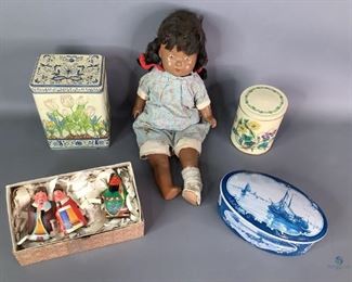 Vintage Doll and Tins
Includes three (3) chineses figures,three (3) vintage tins,and a vintage doll.