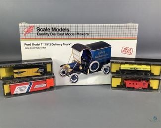 Models Car and Trains
Four (4) Bachmann N scale trains in a small cases and one metal model Ford model T "1912 Delivery truck".