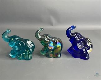 Fenton Elephants
Three (3) Fenton Elephants. Teal one is hand-painted and signed. Cobalt is also hand-painted and signed. The third one is carnival glass.