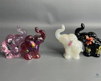 Fenton Elephants
Four (4) Elephants. Carnival Glass one is marked 100 years 2005; White is hand-painted, marked 1988 and signed; Pink one is hand-painted and signed; and black one is hand painted and signed.
