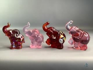 Fenton Elephants
Four (4) Fenton Elephants. The deepest red one is hand-painted and signed.