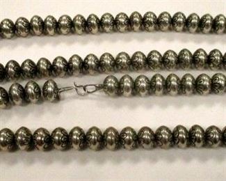 NATIVE AMERICAN BEAD NECKLACE. 33.5" LONG. 6.0 TROY OUNCES. AS TAG STAMPED 'PY'. ATTRIBUTED TO PATARICK YAZZIE. THE BEADS ARE SOMETIMES REFFERED TO AS "NAVAJO PEARLS"