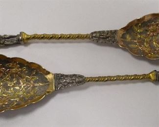 PAIR OF REPOUSSE' APOSTEL SERVING SPOONS. 8 1/8" LONG