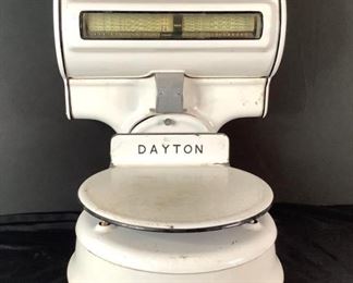 Dayton Money Weight Scale
White porcelain over metal manufactured by Dayton Scale company Division. Stamp plate also states International Business Machines Corporation. Machine shows minor scuffs or wear. 25"Hx19"Wx19"D.