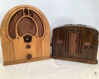 1930's Philco Table Radios
One 1933 Philco cathedral style table tube radio with original electric cord. No back panel, some scuff marks and wears on edges, fabric shows some fraying. One 1930's Philco table tube radio with original electric cord. Minor scuffs, some wear on bottom edges/corners. No back panel. Unknown working condition of both.