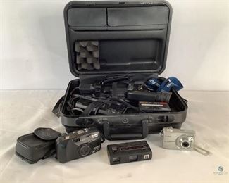 Multiple Camera/Handycam
One Pentax 38-70mm autofocus film camera with case. One Kodak AF 36-1.8mm digital camera. One Kodak Tele-Instamatic 608 camera. One Sony Video 8 Handycam. Includes hard case with key, battery and battery charger, and one new film cassette.