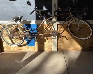 Huffy Daisy Tandem Bicycle
Bicycle built for Two! Huffy Daisy brand. Gold colored (appears to have been repainted). No identifying marks visible. Has front and rear baskets & bells on handlebars. Used condition.