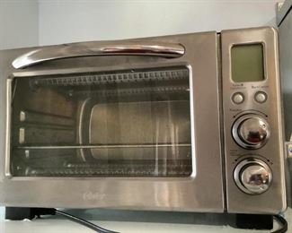 Oster Toaster Oven
Oster Toaster Oven (no model number visible). H12" x W19" x D13" Used condition. Small ding in front (see photo).