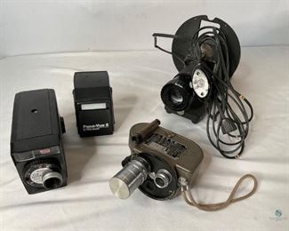 Vintage Movie Cameras and Slide Projectors
One Kodak Brownie Fun Saver Movie Camera. One Revere Eight Model 99 movie camera. One Pana-Vue 2 slide viewer by View Master. One Argus slide projector with cord (cord has a few damaged areas). All items are in unknown working condition.