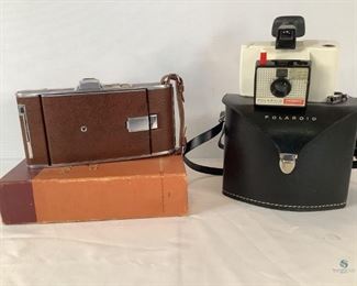 Vintage Polaroid Cameras
One Polaroid Land Camera Model 95 with brown carry strap and in original box with original paperwork. One Polaroid Land Camera Swinger Model 20. Comes with original camera case and has original paperwork. Bonus--includes 3 boxes of Sylvania AG1 flashbulbs.
