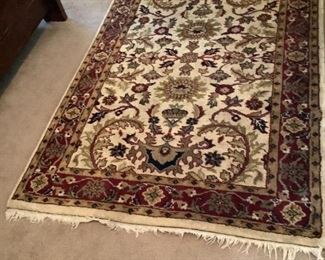 Small Area Rug
Red, Taupe and green floral design on beige background with fringe on edges. Rug shows wear and needs to be cleaned. 74"Hx48"W