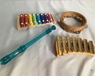 Children's music instruments
Includes two(2) xylophones, Tambourine,and a teal plastic recorder.