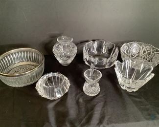 Orrefors Crystal Bowls
Three (3) crystal bowls by Orrefors of Sweden. All have Orrefors mark on the bottom. One round petal bowl, 4.5"Hx7.5"W with minor scratches on the bottom. One petal candy bowl, 4.25"Hx6.25"W. One Sigma bowl with three tiny felt pads on the bottom. 3.5"Hx6"W. Two cut glass decorative bowls. One with silver tone removable rim. Silver tone is worn.4"Hx9"W. The other has a scalloped rim, 3.75"Hx8.5"W. One Royal Doulton crystal vase, has stamp on bottom. 6.5"Hx5.5"W. One small Waterford crystal pitcher, has stamp on bottom edge, 4.5"H.