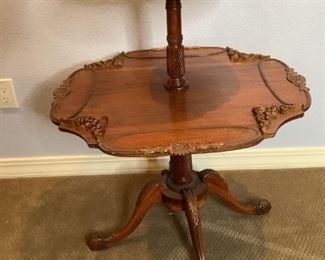 Vintage 2-Tiered Table
Ornate wooden 2-tiered table. H31" x W26" x D26". No manufacture visible. Scratches on top (see photos).