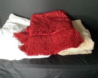 Blankets/Comforter
Four (4) pieces: Tan fuzzy blanket (unknown size - Better Homes & Garden brand). Grey w/cream comforter (no tags - unknown size). White comforter (no tags - unknown size). Red w/fringe - heavy lap blanket (not as - unknown size)
