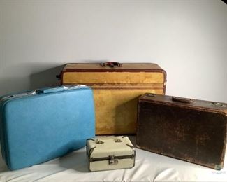 Vintage Suitcases
One small cream colored case. One small blue hard suitcase . One dark brown suitcase, it is coming apart. One tan and brown suitcase with material inside. All pieces have wear inside and outside. Some pieces do not lock or close properly.