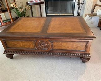 Ethan Allen Hastings Coffee Table. Two end drawers for storage with brass hardware. Burl side panels with medallion carvings and turned bun feet. 50ʺW × 31ʺD × 19ʺH  (new price was $1299 with original receipt in hand)