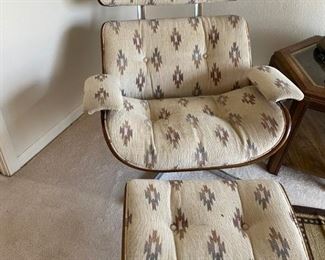 $ 140.00 - Mid Century Lounge Chair and Ottoman Upholstered in a South Western look with walnut accents, and a tilting swivel base - (Needs cleaning)