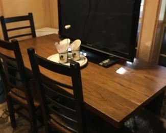 Dining table & chairs, flat screen tv