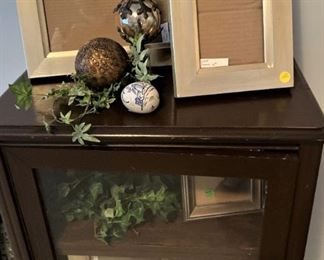 Glass front cabinet; more frames