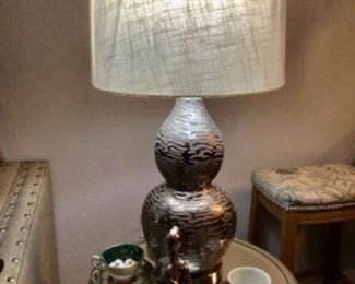 One of a pair of tables with lamps 