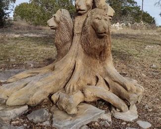 Carved lion pride from Cypress stump from Florida