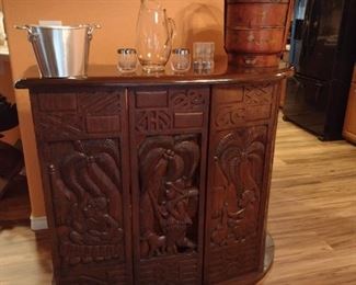 Carved teak bar