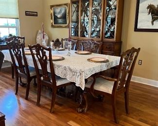 $875~OBO~ EXQUISITE BALL AND CLAW FOOT DINING TABLE AND SIX CHAIRS INCLUDING TWO CAPTAINS CHAIRS 