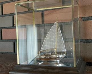 Small sailboat in enclosed case