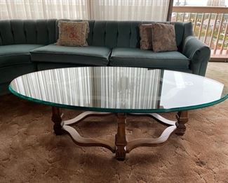 Glass coffee table with wood base