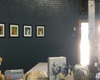 Magazines, bolt of fabric and nautical decorations.  Note in picture the unusual round brick wall, these rooms or still painted blue in honor of the Blue Room music show.