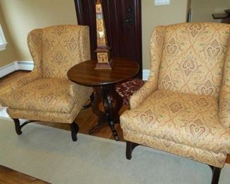 Pair tan & burgundy paisley print chairs ( $ 950 pr)