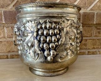 Cast Brass-Tone Urn Planter with Vining Grapes &
Lions Head Ring Handles 
Piece is Lightweight