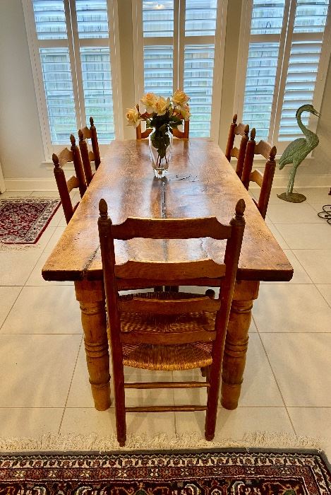 An antique French Farmhouse table with six rush seat chairs, purchased from Inessa Stewart Antiques & Interiors…. $2,400.00 for the table with chairs