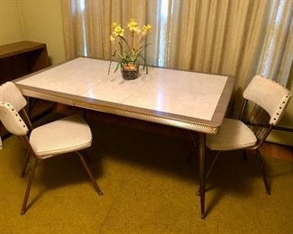 Vintage yellow and cream colored formica table w/ 4 chairs (2 not pictured)