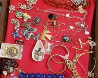 A view of some jewelry, costume, some silver, few gold