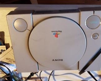 Playstation one of two with controllers