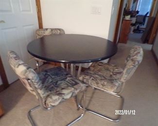 nice table w/4 chairs