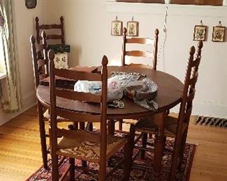 Dining table with 6 ladder back rush seat chairs