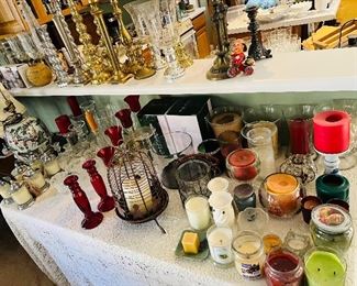 Collection of candles and candlesticks