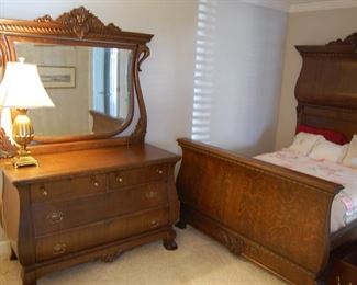 Very old-well kept oak dresser and high back bed