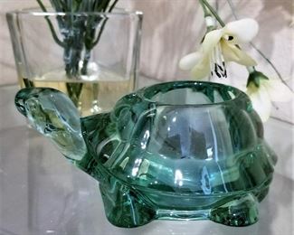 Green glass turtle. We have outdoor turtles too.